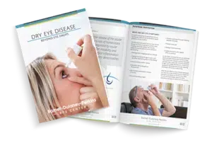 Open magazine or booklet displaying a kissing couple on the cover and pages filled with text.