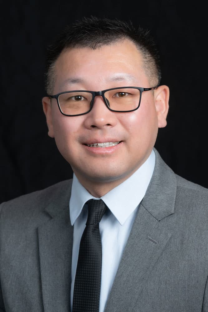 Professional headshot of Retinal Specialist Dr. Delu Song, MD.