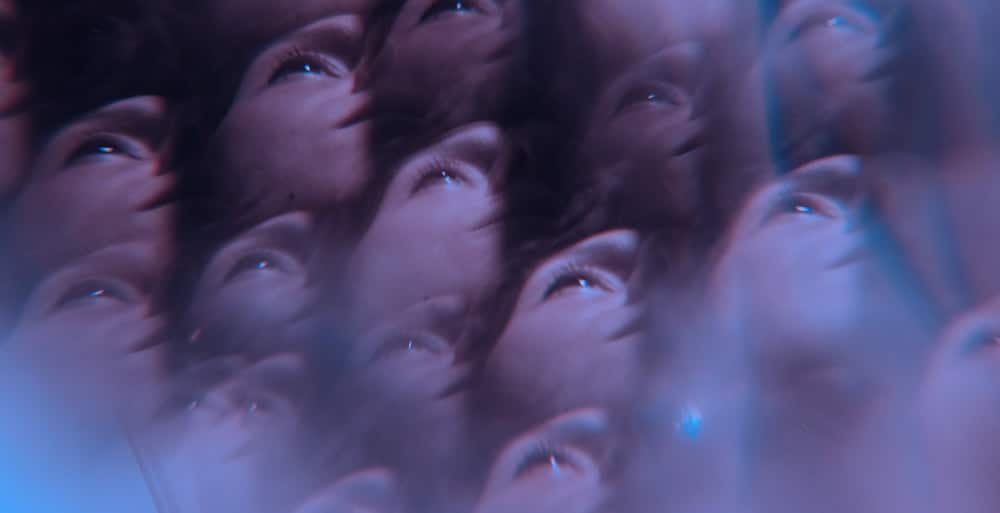 A kaleidoscopic vision of faces asking if my vision needs to be bad for LASIK.