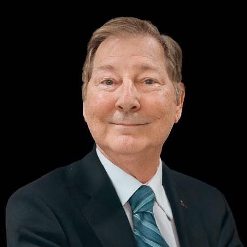 Professional headshot of ophthalmologist Dr. Michael Campion, wearing a dark suit and patterned tie, smiling in front of a neutral background.
