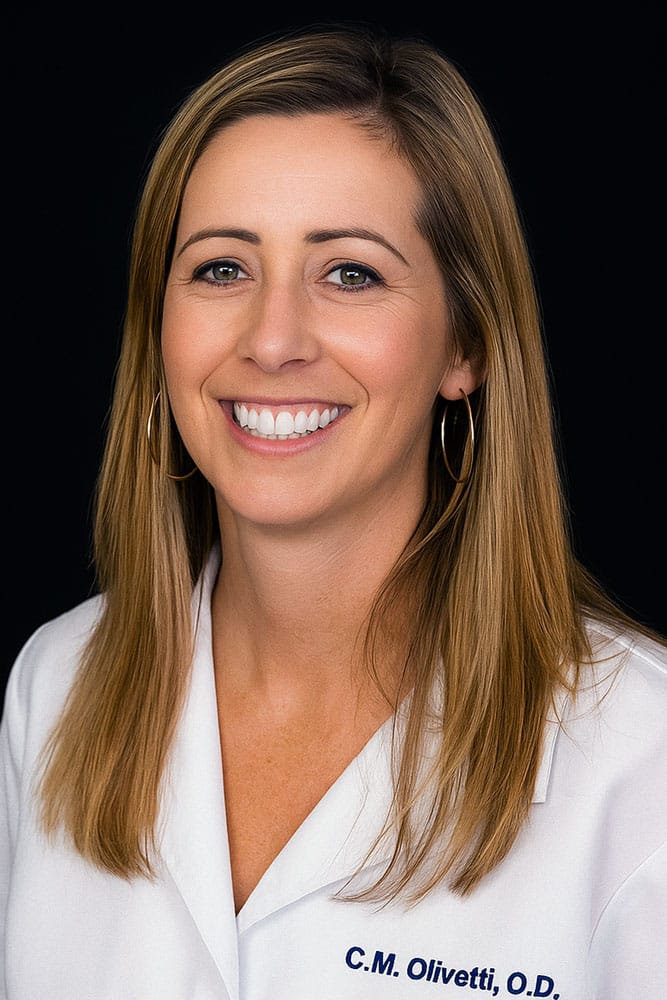 Headshot of Dr. Christina Olivetti, OD smiling against a black background.