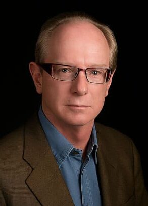 Professional image of Brian Horsman, MD against a black studio background.