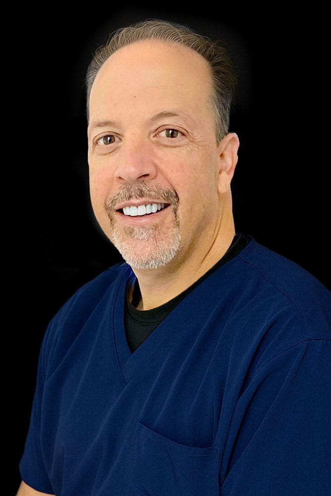 Dr. Anthony Nappi against a black background.