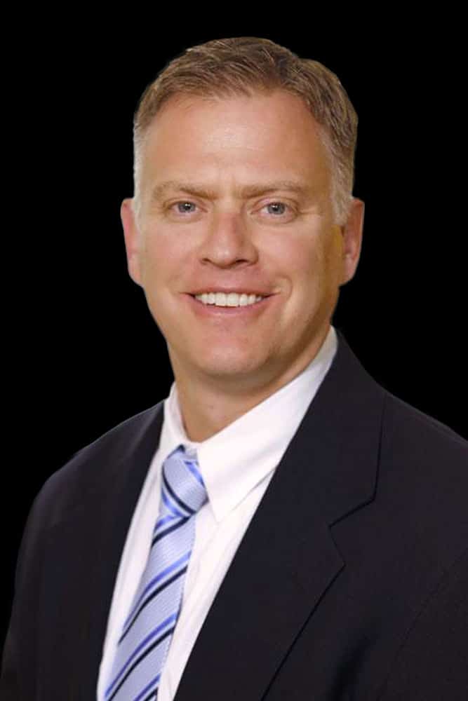 Professional headshot of Dr. TJ Johnson.