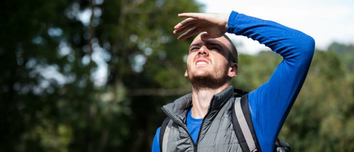 male-hiker-sielding-his-eyes.jpg