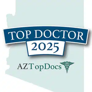 Top Doctor 2025 badge with a blue ribbon and the AZTopDocs logo.