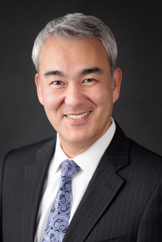 Professional headshot of Dr. Aaron Amacher III, MD, FACS.