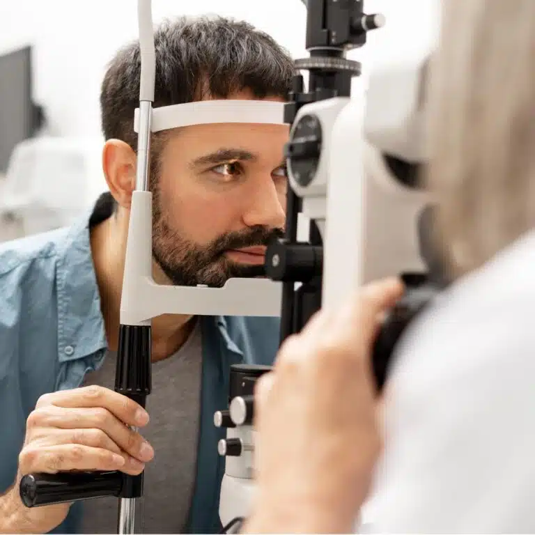 Man getting LASIK recovery follow-up evaluation