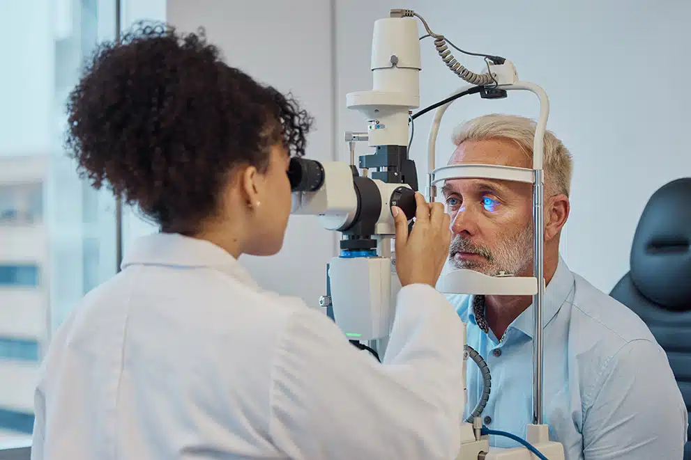 A doctor providing a comprehensive eye exam to her patient.