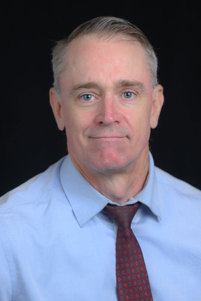 Professional headshot of Dr. Alton Rossman, OD.