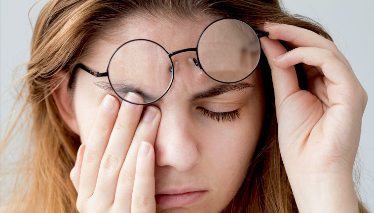 Image of a young girl excessively rubbing her eyes. Illustrating one of the precursors to keratoconus.