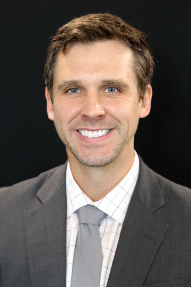 Professional headshot of Dr. William Evans, MD.