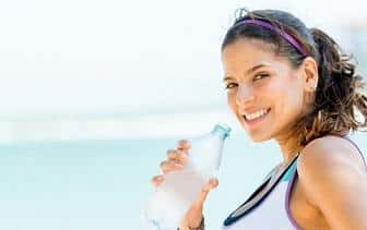 http://www.dreamstime.com/stock-image-sports-woman-drinking-water-bottle-outdoors-image30639281